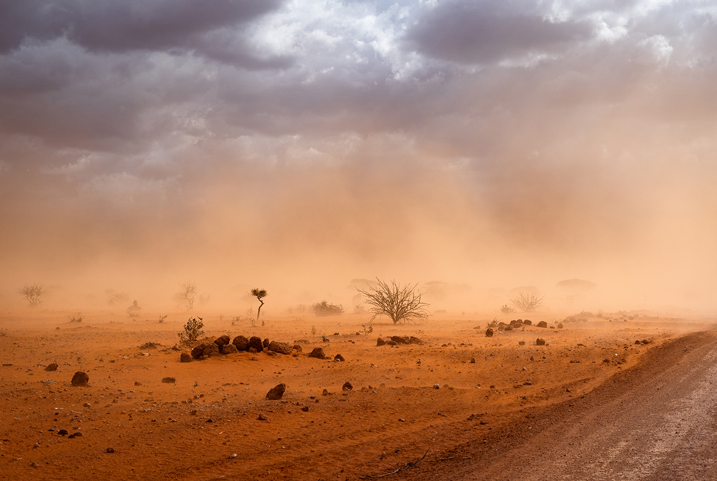 dirt road and yellow orange dusty sandstorm Somalia region