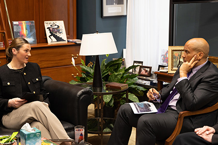 student talking with Sen. Cory Booker of New Jersey