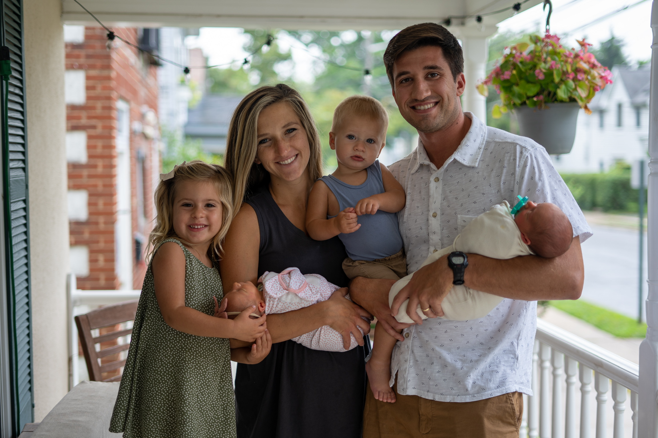 A woman and man with four children