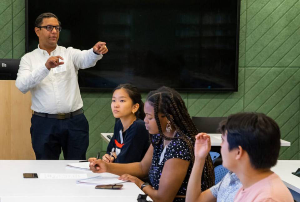 Mihir Kshirsagar, Tech Policy Clinic Lead, calls on a Fellow during a workshop session. Photo courtesy of the Center for Information Technology Policy