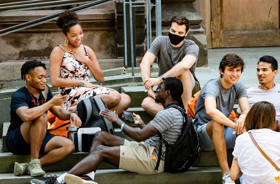 Students gather on the steps of Witherspoon Hall, taking advantage of a leisurely summer afternoon and making new connections as they embark on their graduate school career.  Photo by Denise Applewhite, Office of Communications