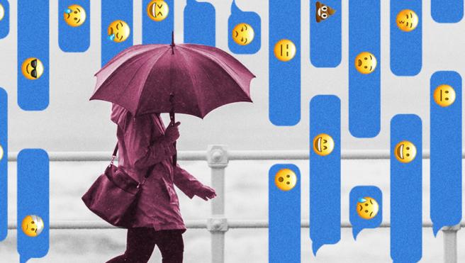 person holding umbrella with emojis in the background
