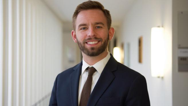 Man with a brown tie