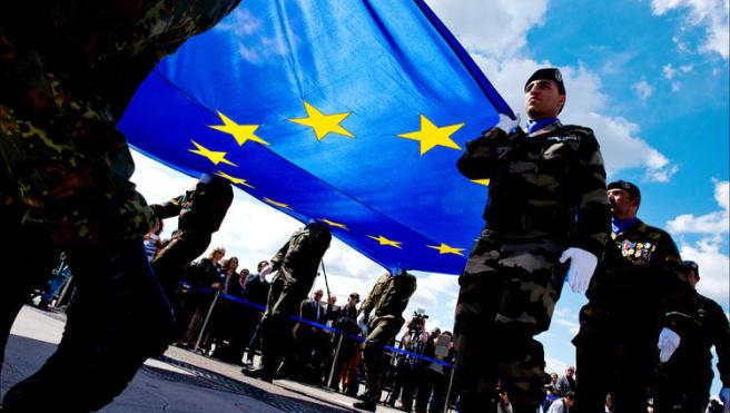 soldiers holding EU flag