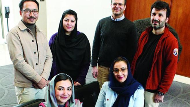  Members of the Afghanistan Policy Lab include, back row from left, Lutf Ali Sultani, Storai Tapesh, Muhammad Idrees Ghairat, and Gran Hewad; and front row from left, Ambassador Adela Raz and Naheed Farid. Photo: Frank Wojciechowski