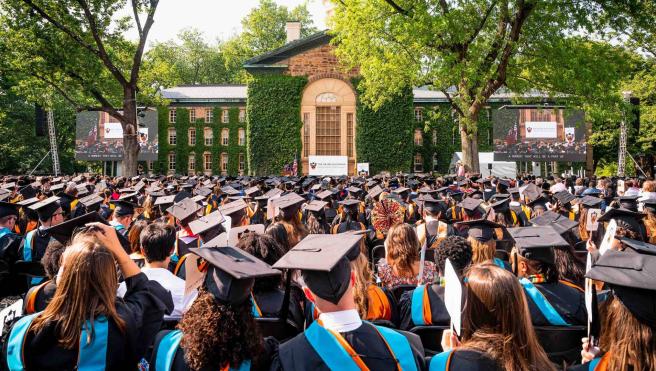 Princeton’s recent Ph.D. and master’s degree recipients were honored at the 2023 Hooding and Recognition Ceremony on May 29 on Cannon Green. Photo by Nicole Guglielmo.
