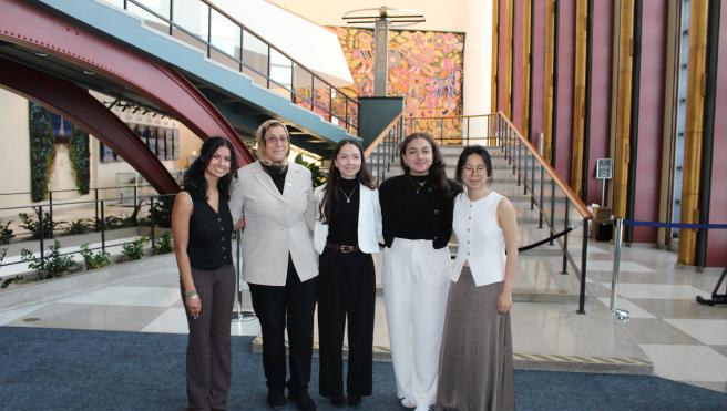 Dean Amaney Jamal with students
