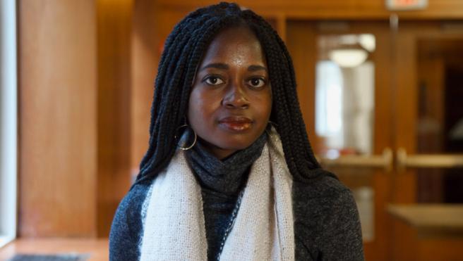 Joelle Gamble wearing a white scarf