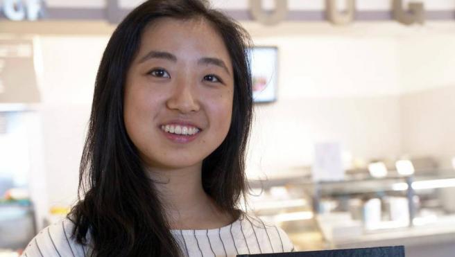 Cecilia Shang, a member of Princeton’s Class of 2018, with her senior thesis 