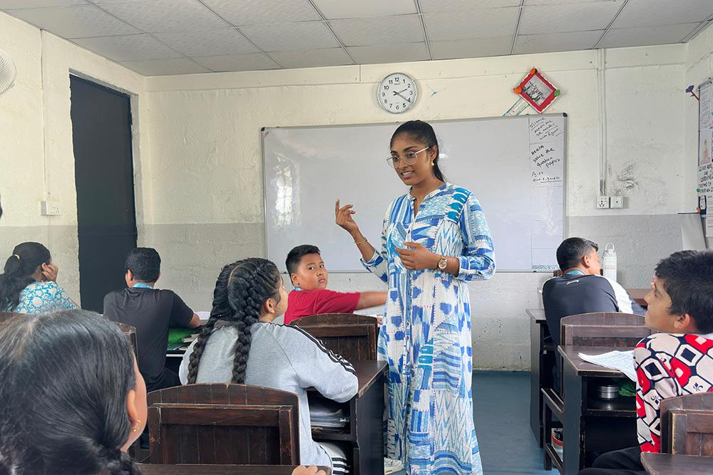 Surujdai Mukhram MPA ’26 with students