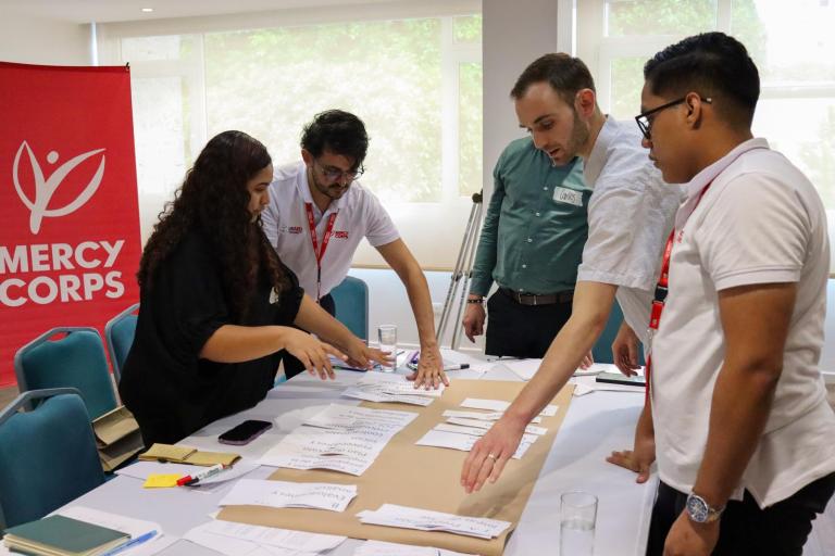 Patrick McCabe, MPA ’26 with fellow teammates at VenEsperanza
