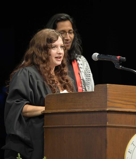 2024 SPIA Hooding Ceremony student speakers, Brontë Forsgren and Anthony Solís Cruz