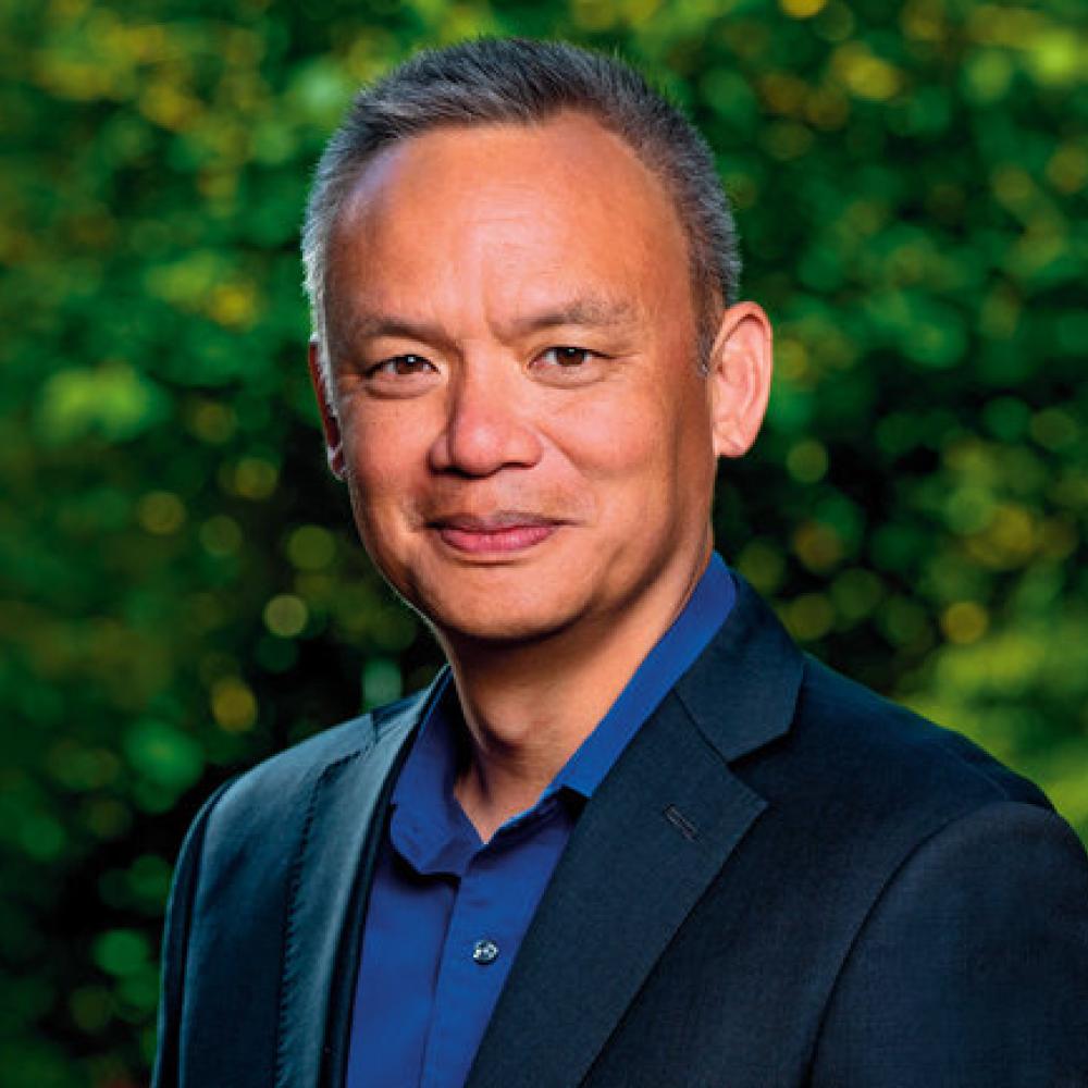 Edward Wong in suit jacket and dress shirt