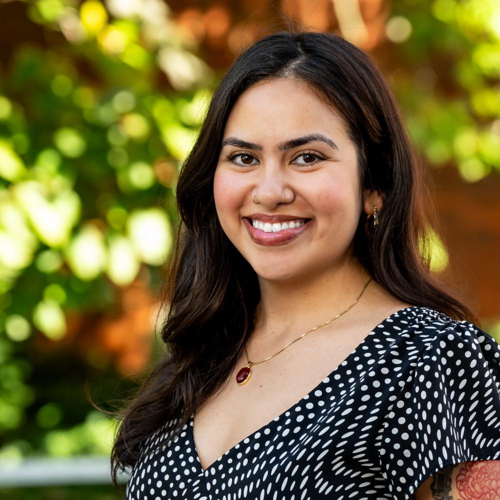 headshot of Thelma Carrera