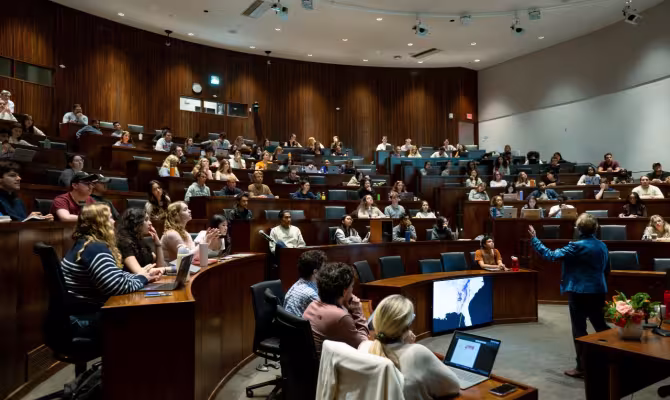 students listening to professor
