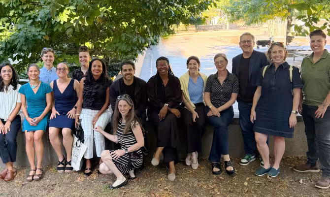 Attendees of the Institutional Food Systems Convening pause for a photo.