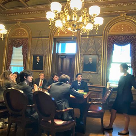 SPIA alumna Caroline T. Nguyen, Director for Clean Energy and Global Public Sector Partnerships in the Council on Environmental Quality at the White House, briefs Lichtenstein Institute International Policy Associates during their visit to Washington, D.C. Photo: Kristoffer Tripplaar