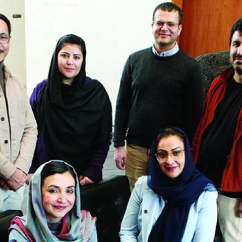 Members of the Afghanistan Policy Lab include, back row from left, Lutf Ali Sultani, Storai Tapesh, Muhammad Idrees Ghairat, and Gran Hewad; and front row from left, Ambassador Adela Raz and Naheed Farid. Photo: Frank Wojciechowski