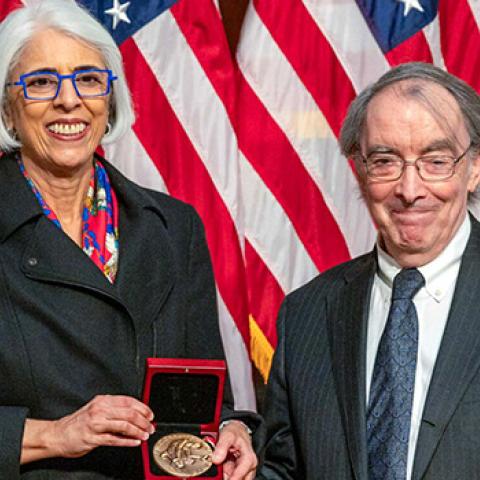 Larry Martin Bartels and Arati Prabhakar. Photo by Ryan K. Morris for the National Science & Technology Medals Foundation.