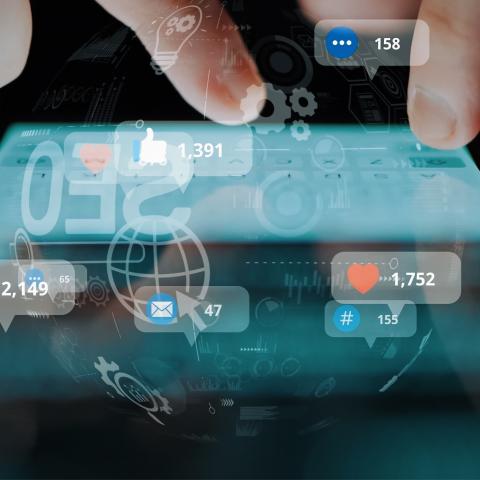 fingers on portable digital screen, Image Credit: Shutterstock