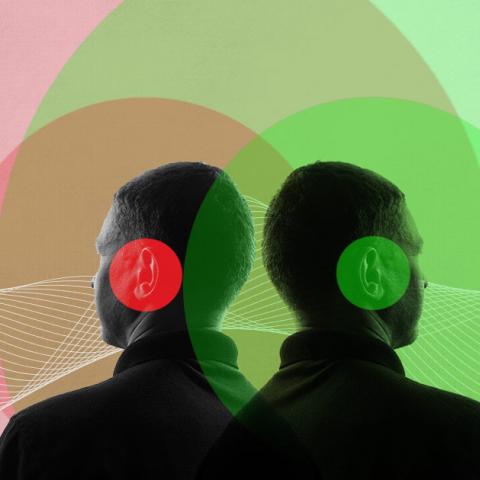 Two Men With Green and Red Dots