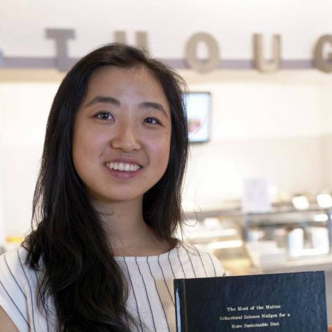 Cecilia Shang, a member of Princeton’s Class of 2018, with her senior thesis 