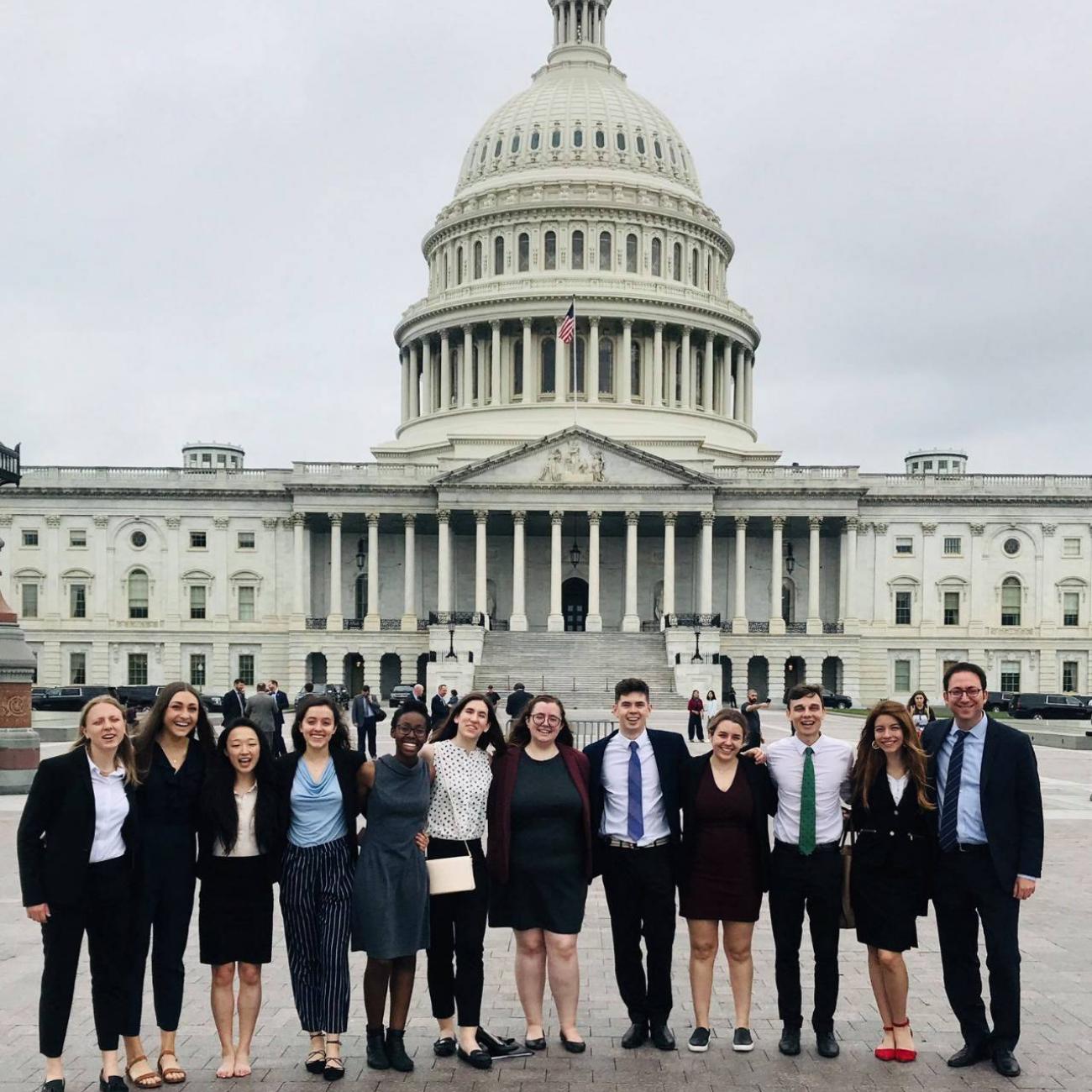 group of students in front of the white house