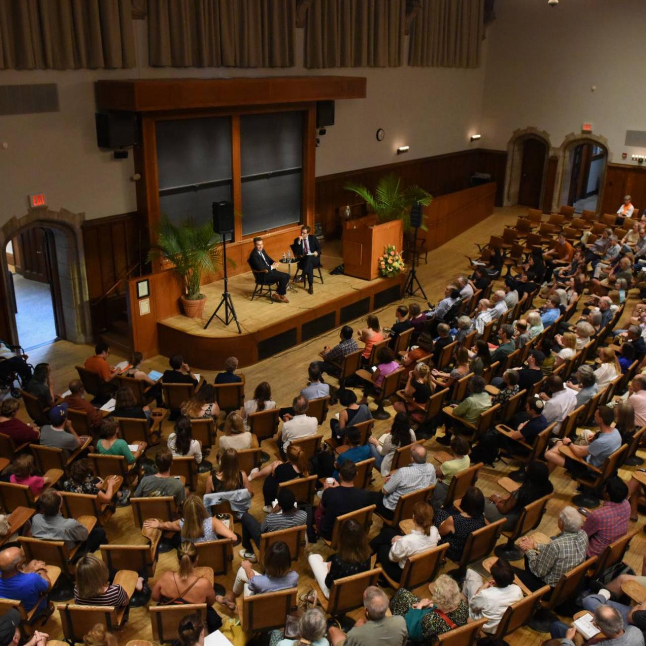 crowd of people attending an event in auditorium