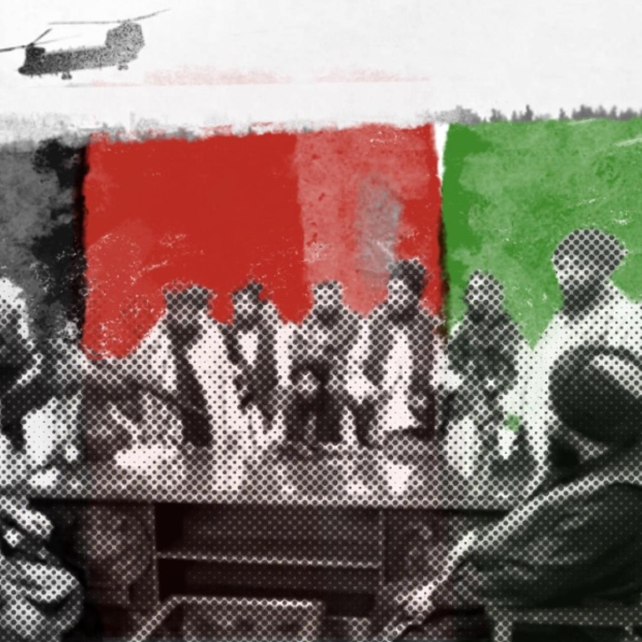 Taliban members gathered around a desk