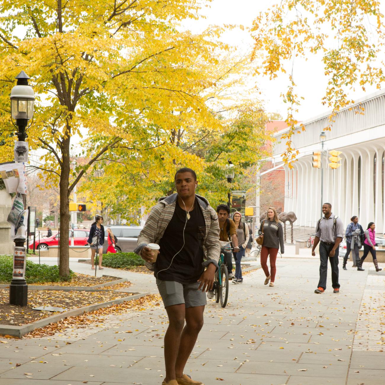 students walking outside of Robertson Hall