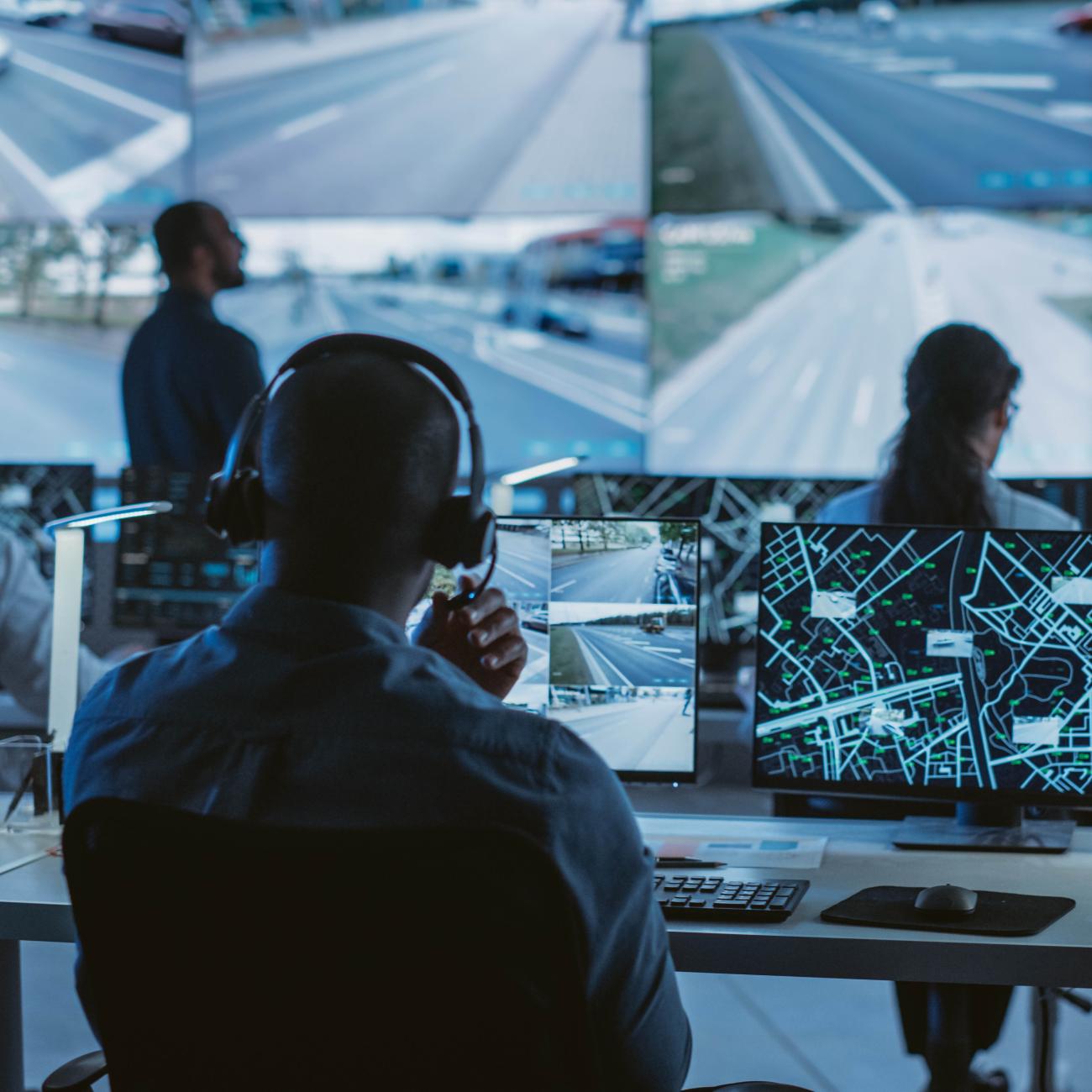 people at a control center