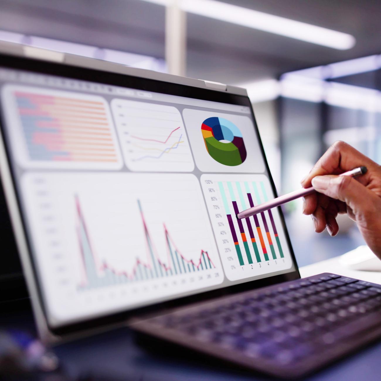 laptop with data graphics