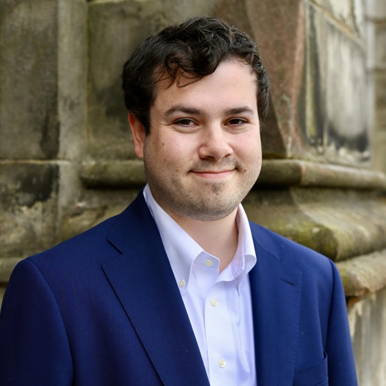 portrait of a student in a suit