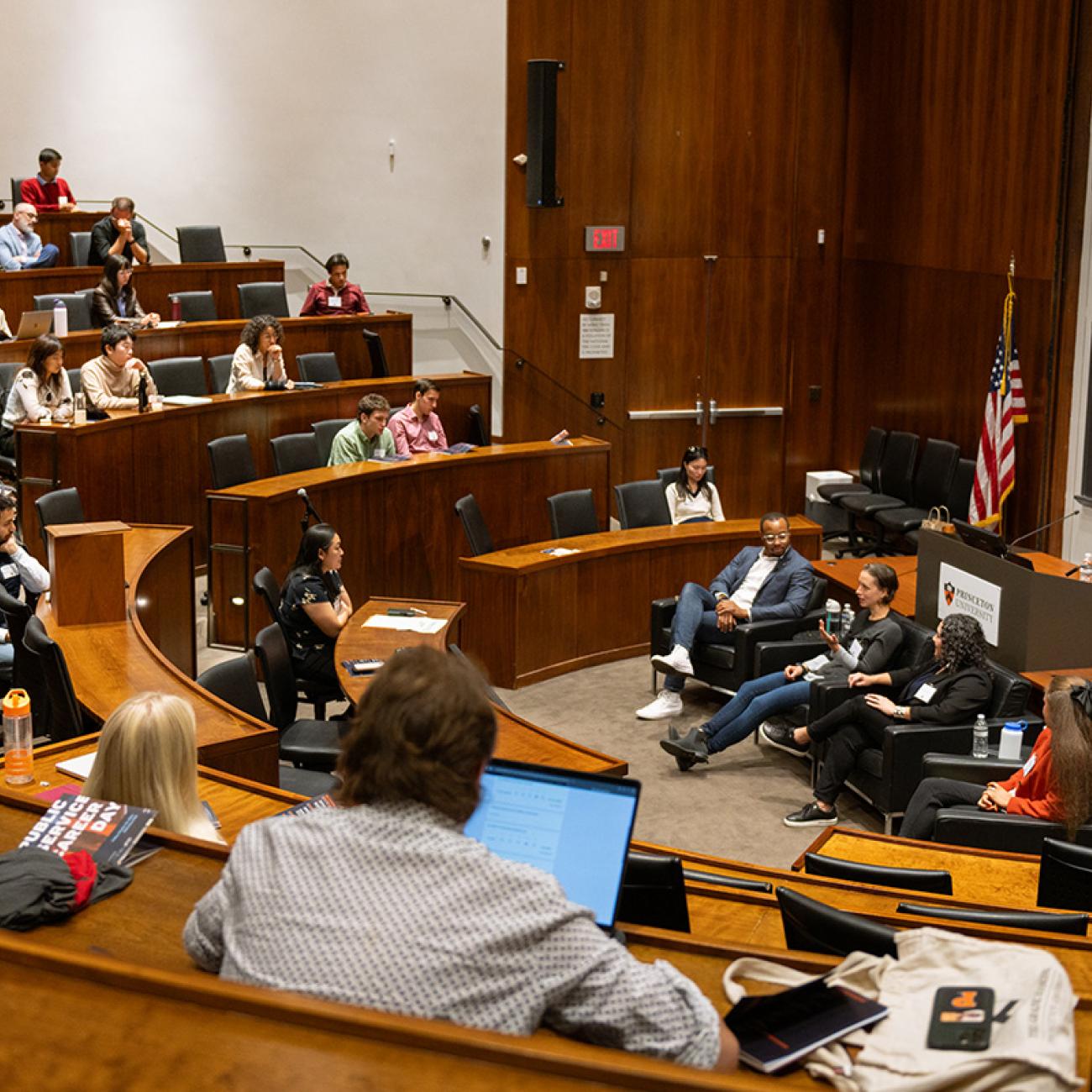 Panelists and attendees at SPIA event in Arthur Lewis auditorium