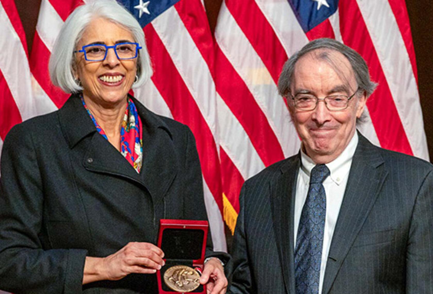 Larry Martin Bartels and Arati Prabhakar. Photo by Ryan K. Morris for the National Science & Technology Medals Foundation.