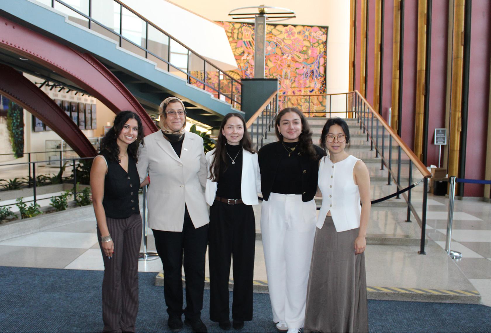 Dean Amaney Jamal with students