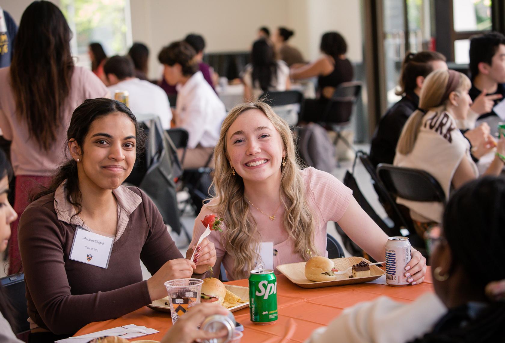 Undergraduate students eating in Shultz Dining cafe