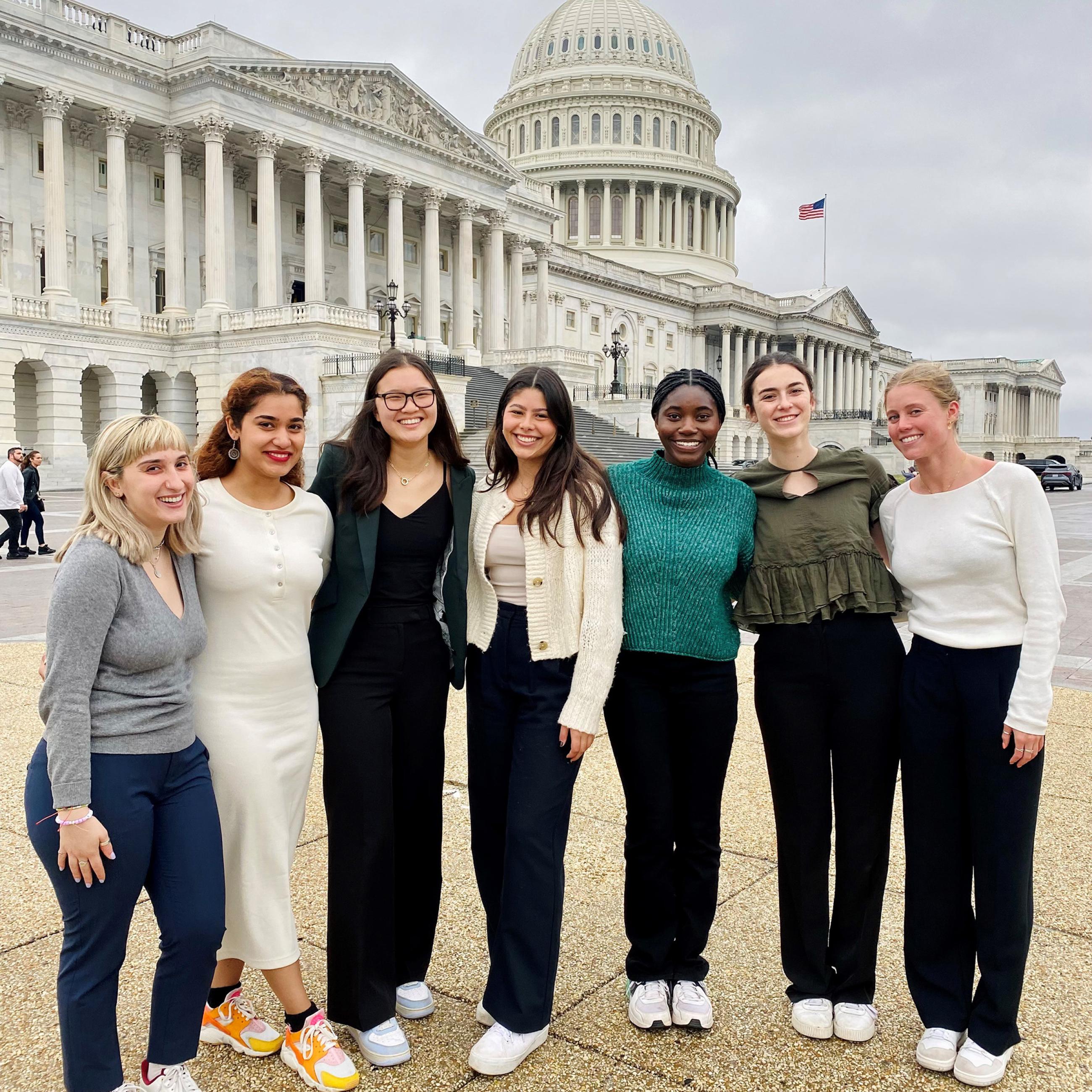 Students in front of Congress before presenting their research 