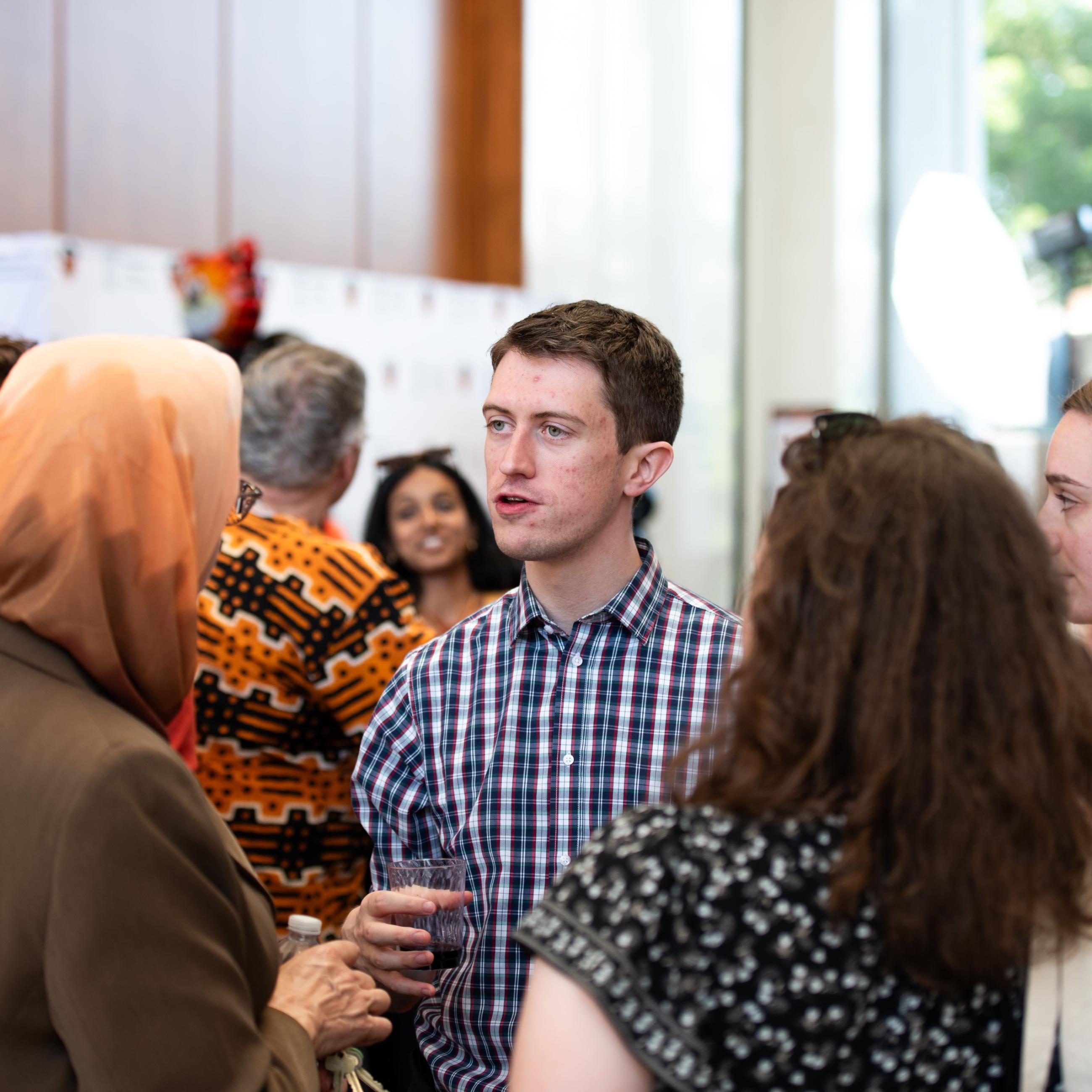 2024 SPIA Alumni Reception participants with Dean Jamal