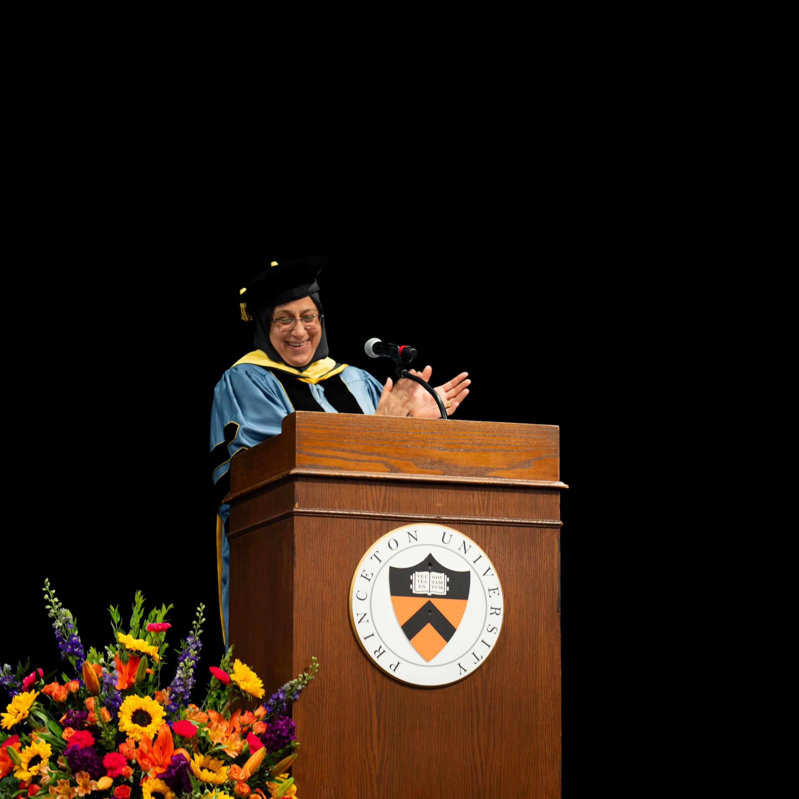 2024 SPIA Hooding Ceremony with Dean Jamal at podium