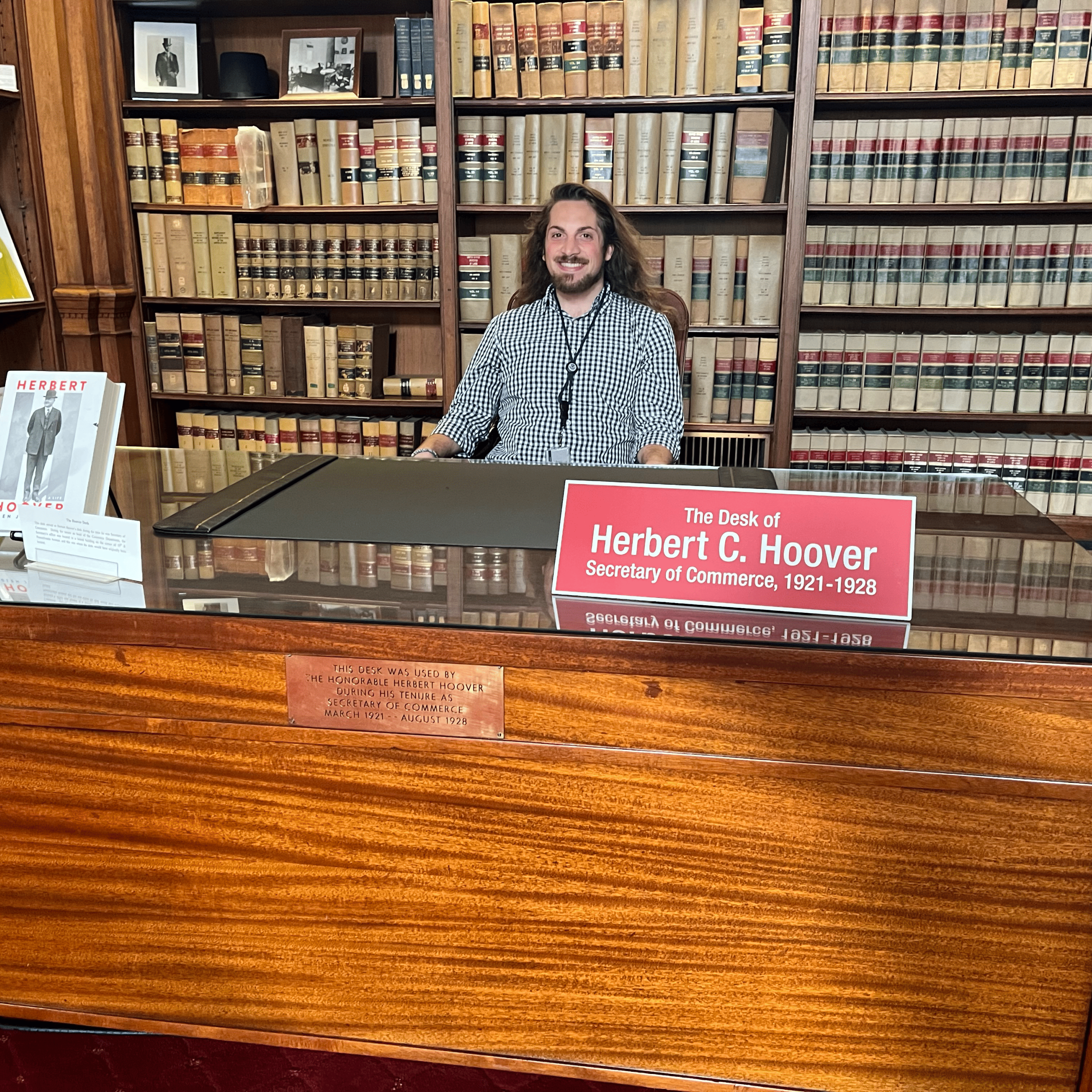 Ethan Magistro ’24, MPP '28 sitting at desk