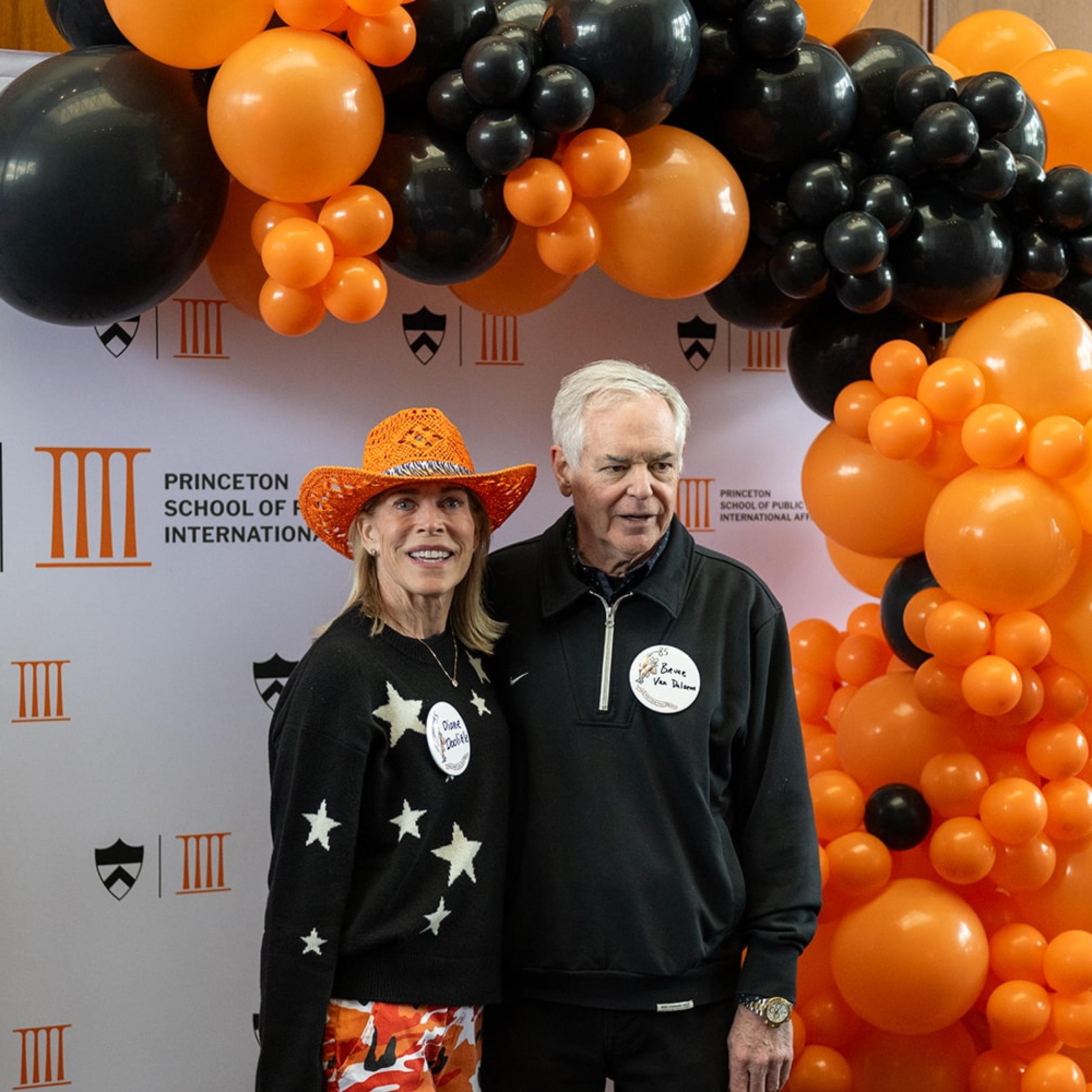 SPIA alum posing for photo booth in Dodd's atrium