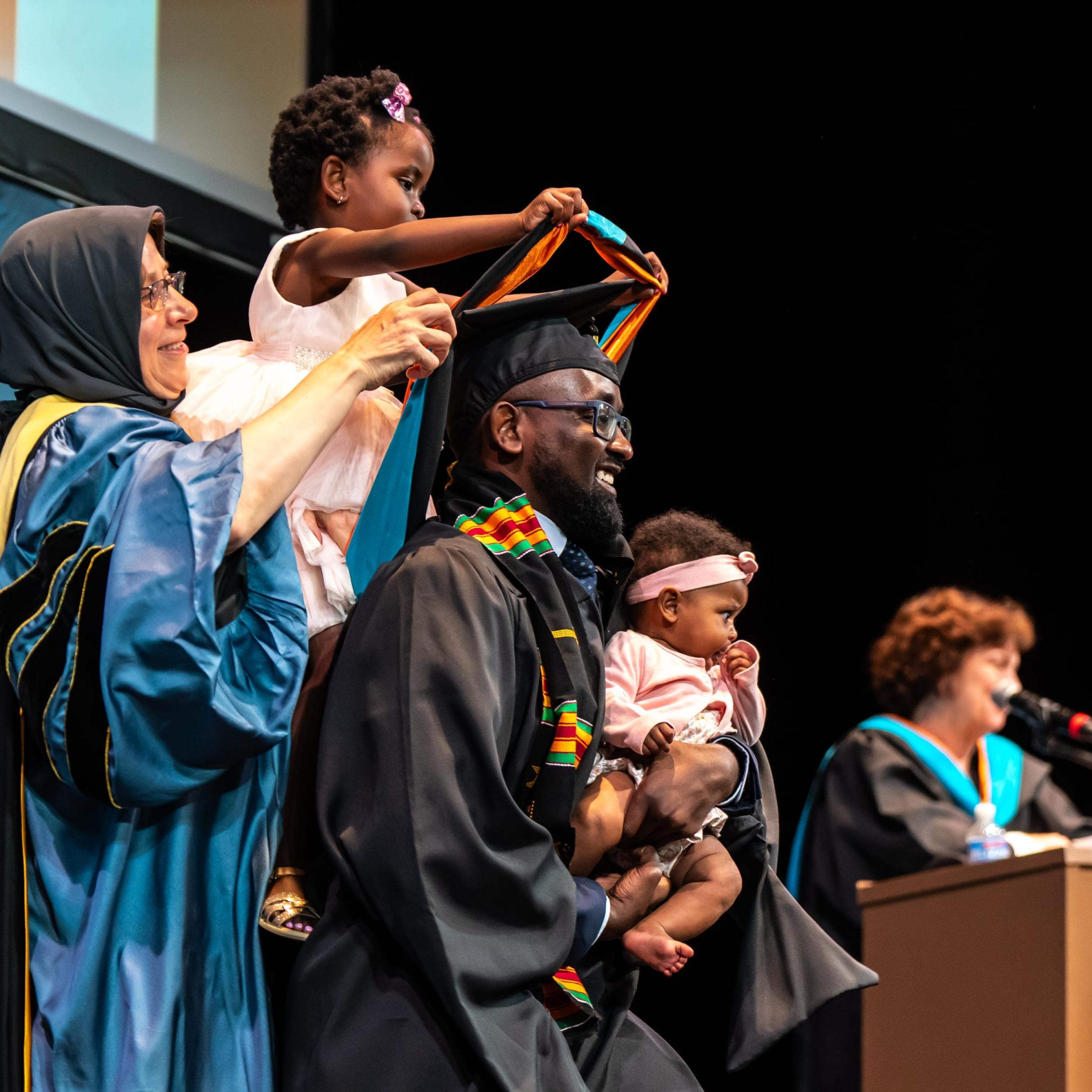 Dean Amaney Jamal hooding SPIA graduate