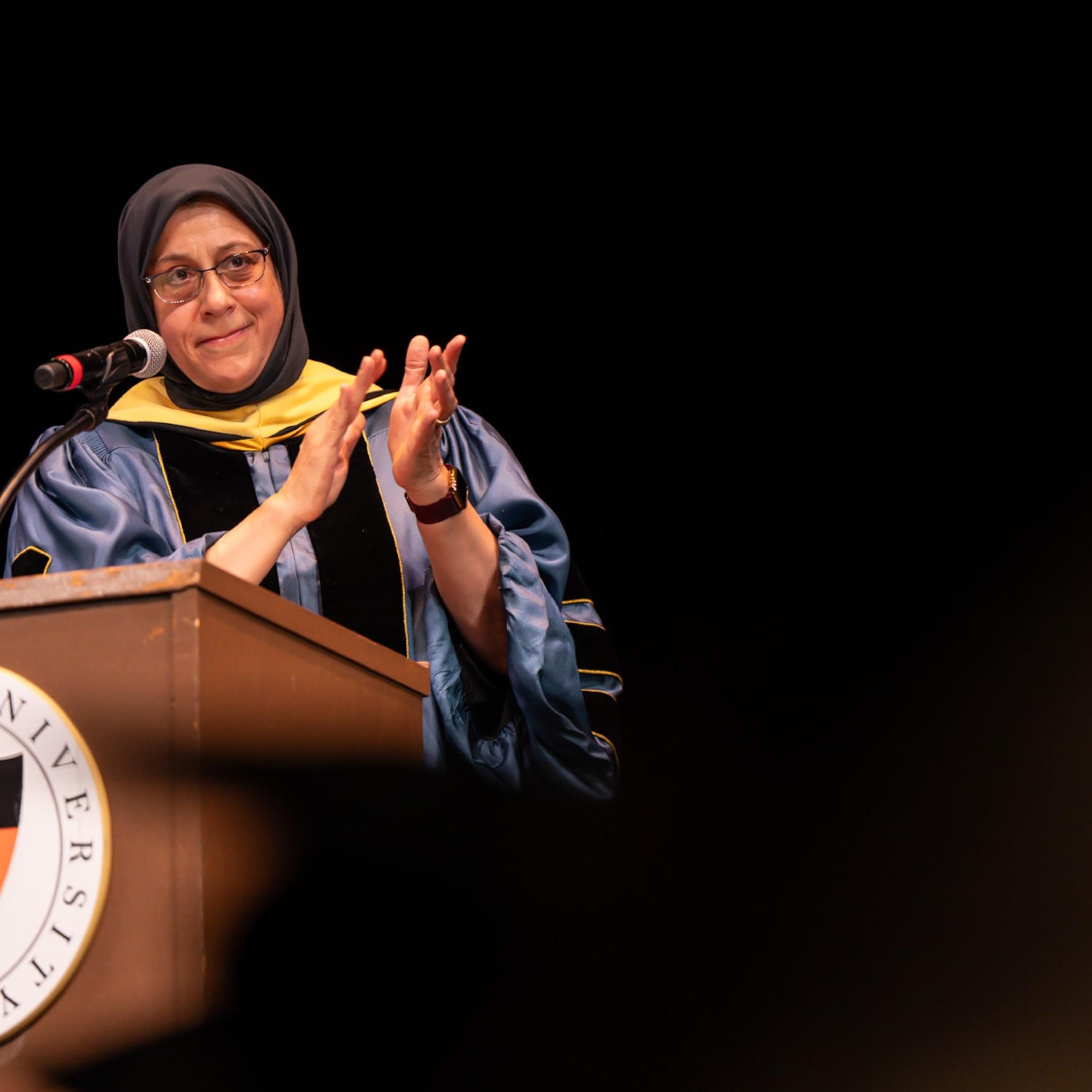 Dean Amaney Jamal speaking at 2025 Hooding ceremony