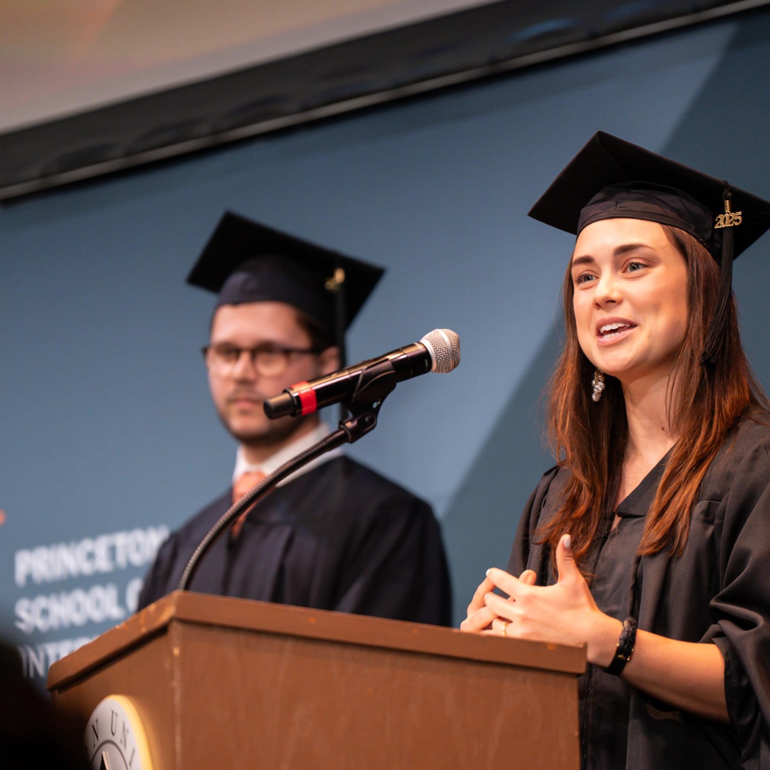 SPIA graduates speaking at 2025 Hooding ceremony