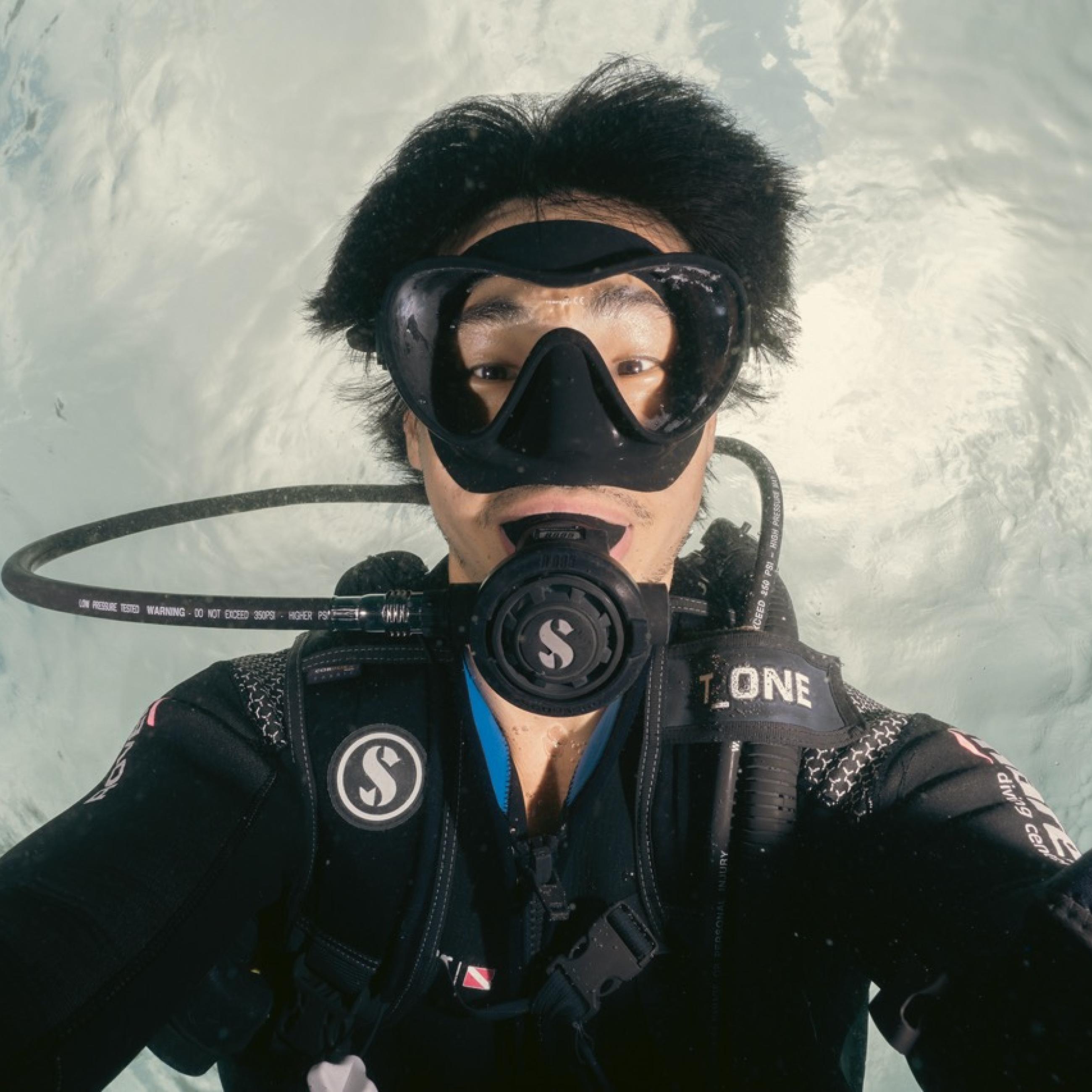 Bing Lin ’16, Ph.D. ’21 in scuba gear