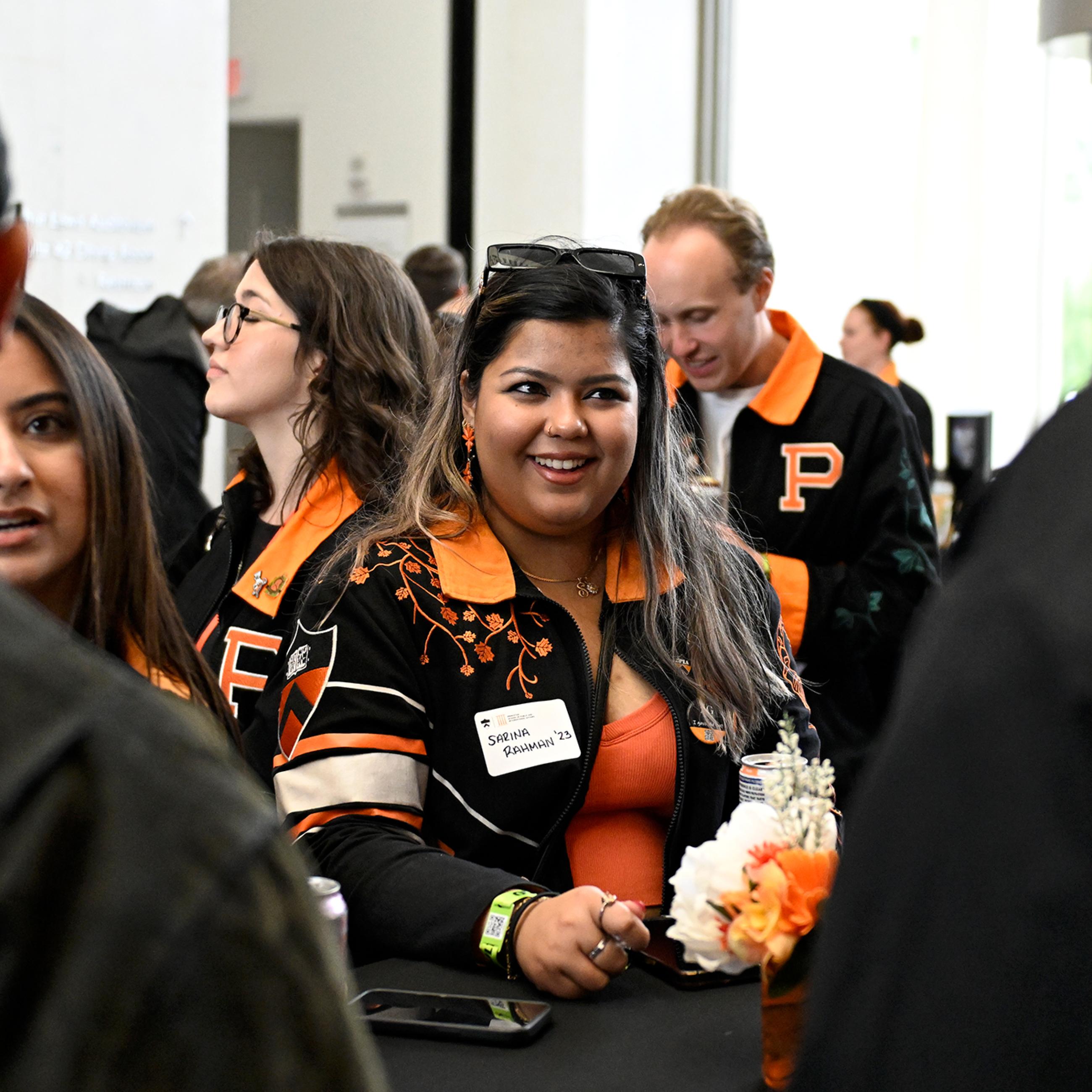 SPIA alumni attending 2026 Reunions reception in Dodd's atrium