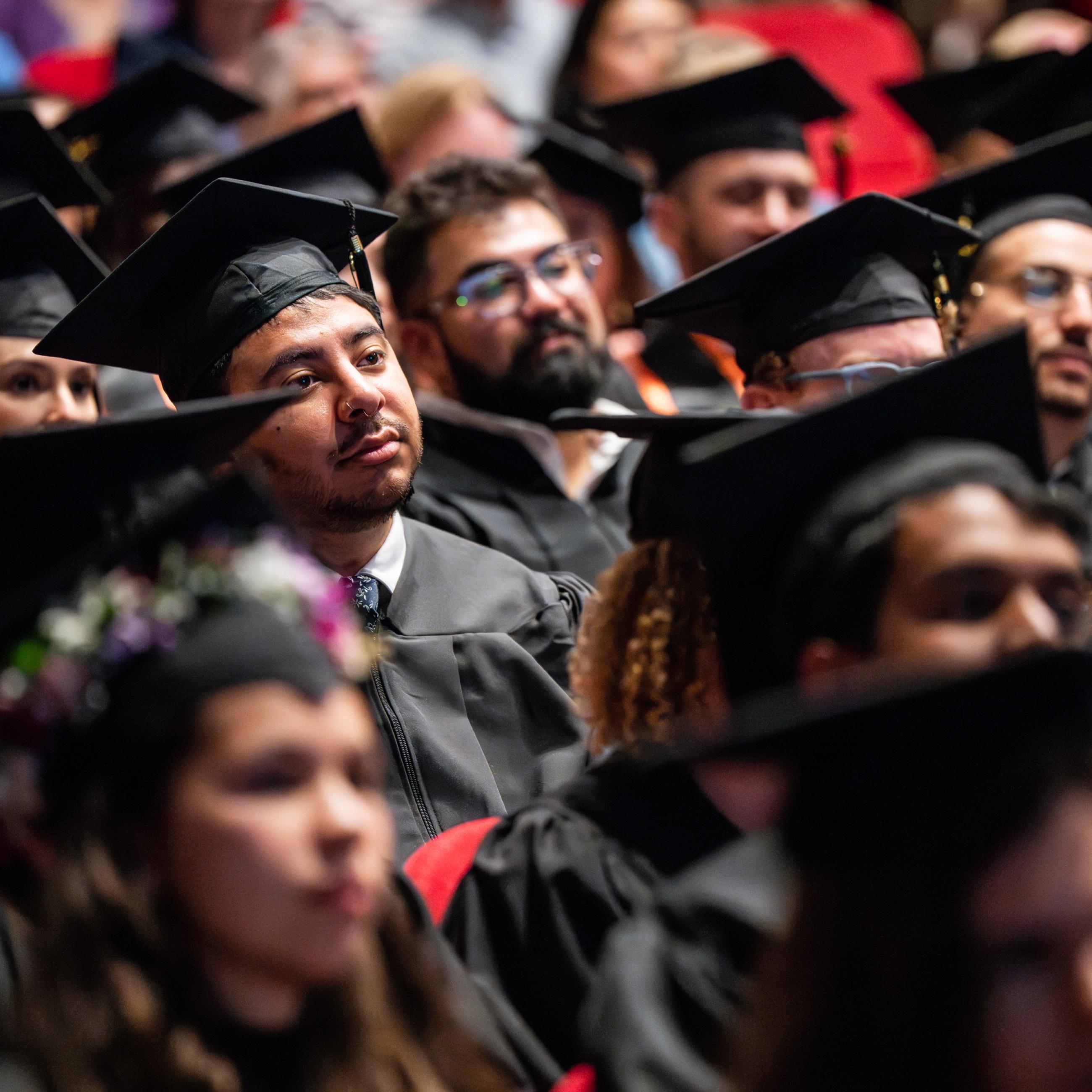 students at hooding ceremony