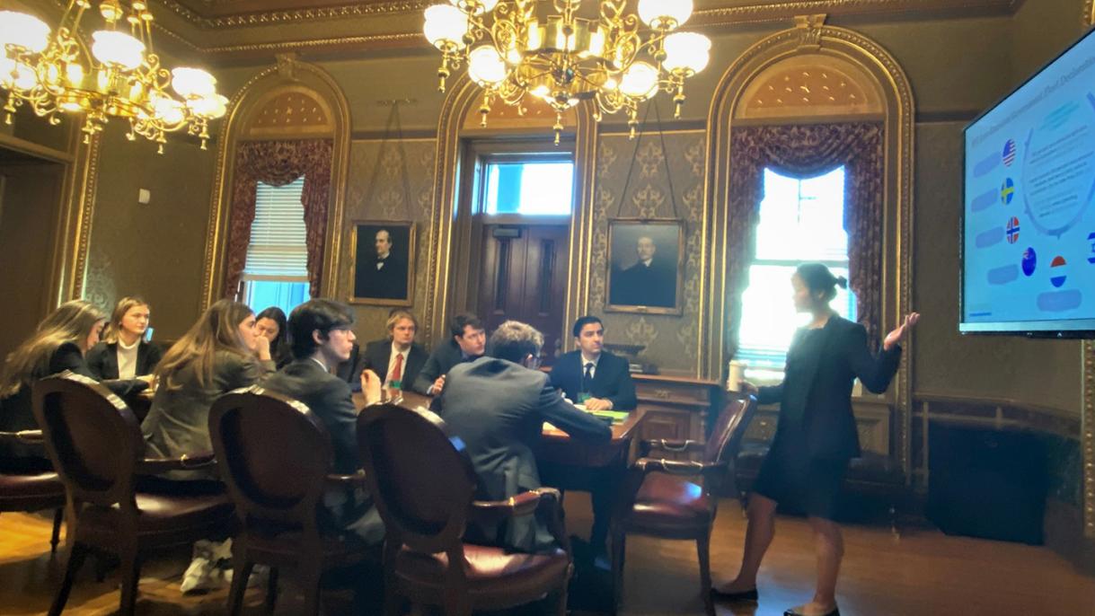 SPIA alumna Caroline T. Nguyen, Director for Clean Energy and Global Public Sector Partnerships in the Council on Environmental Quality at the White House, briefs Lichtenstein Institute International Policy Associates during their visit to Washington, D.C. Photo: Kristoffer Tripplaar