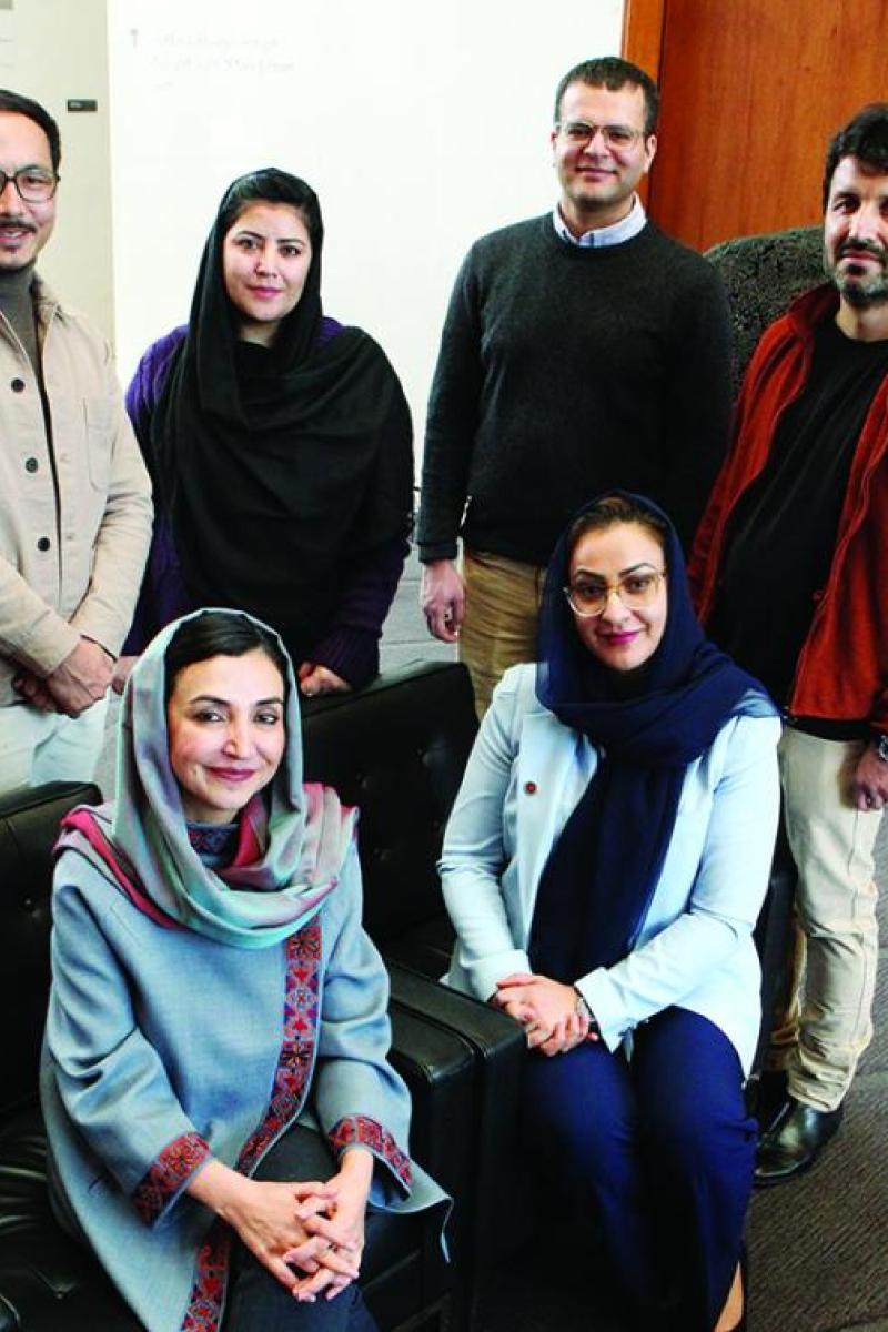 Members of the Afghanistan Policy Lab include, back row from left, Lutf Ali Sultani, Storai Tapesh, Muhammad Idrees Ghairat, and Gran Hewad; and front row from left, Ambassador Adela Raz and Naheed Farid. Photo: Frank Wojciechowski
